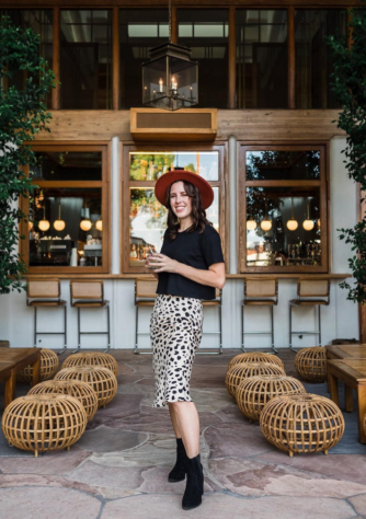 Woman in a leopard skirt and black shirt - cute fall outfit ideas from Wantable. @theirishsummer