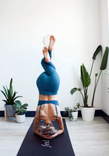Woman doing yoga in the best women's leggings from Wantable Active Edit