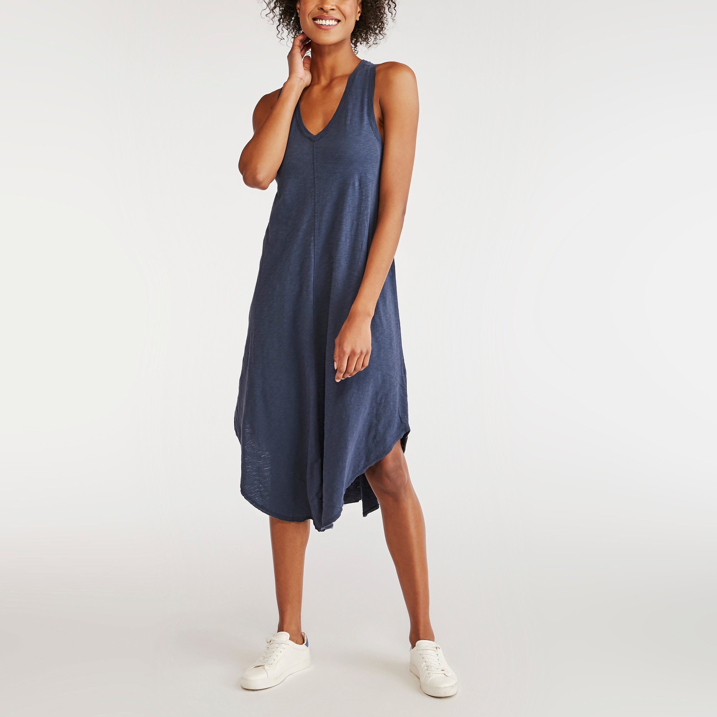 Woman in a greyish blue midi dress and white sneakers - Z-Supply casual summer dress