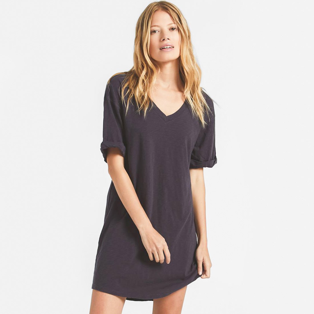 Woman in a black v-neck t-shirt dress by Z-supply - Casual summer dress subscription