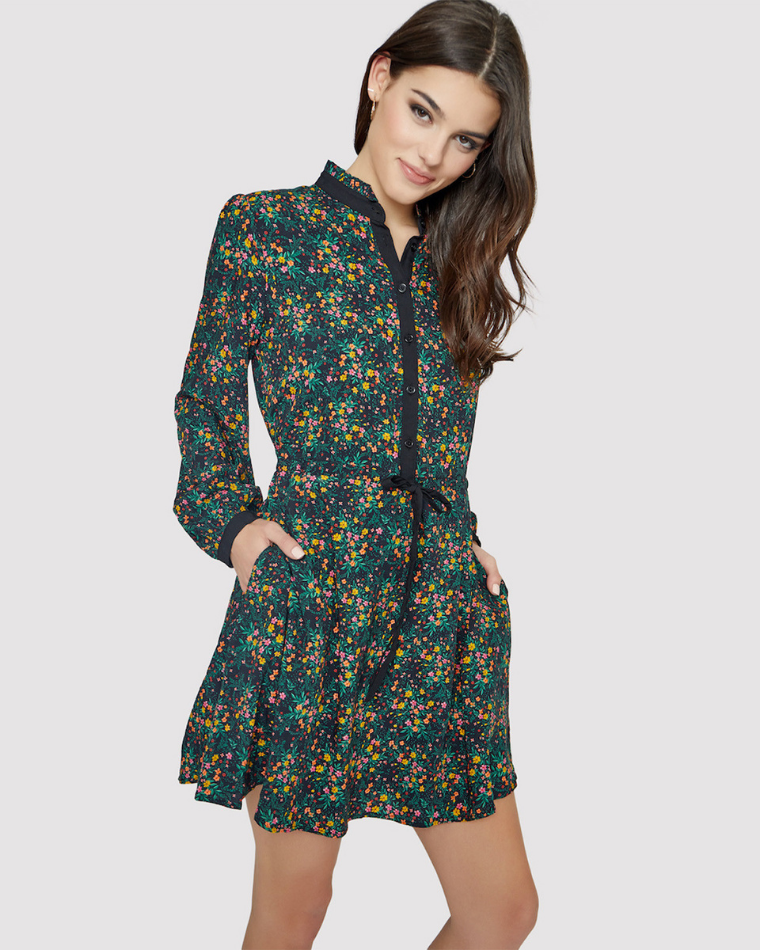 Woman wearing a dark floral dress from Wantable Style Edit