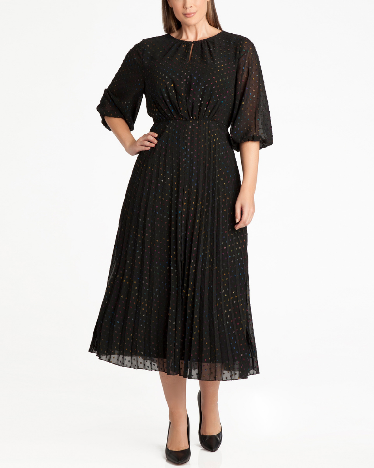 woman wearing a black dress with sheer sleeves from Wantable Style Edit