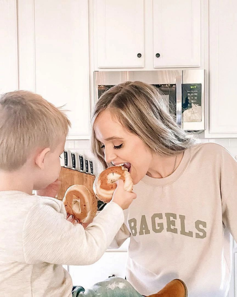 Mother and son eating bagels - ways to love your body @kellabyrd