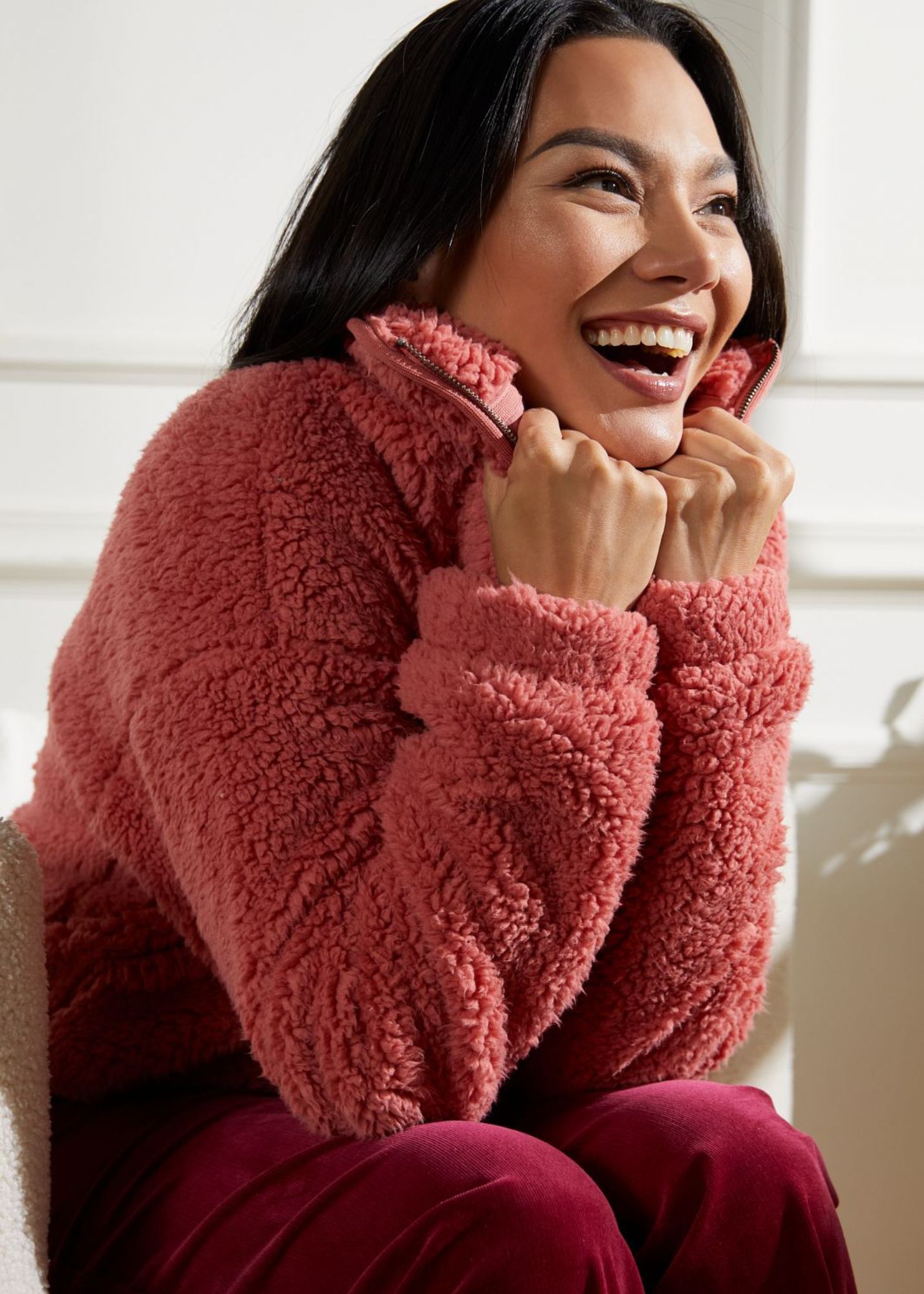 We love cozy Valentine's Day outfits! Try this peach fuzzy pullover paired with red velvet joggers.