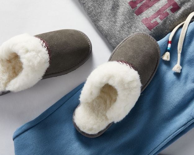 Fleece-lined slides. These are a great footwear option when selecting clothes to wear on an airplane. 