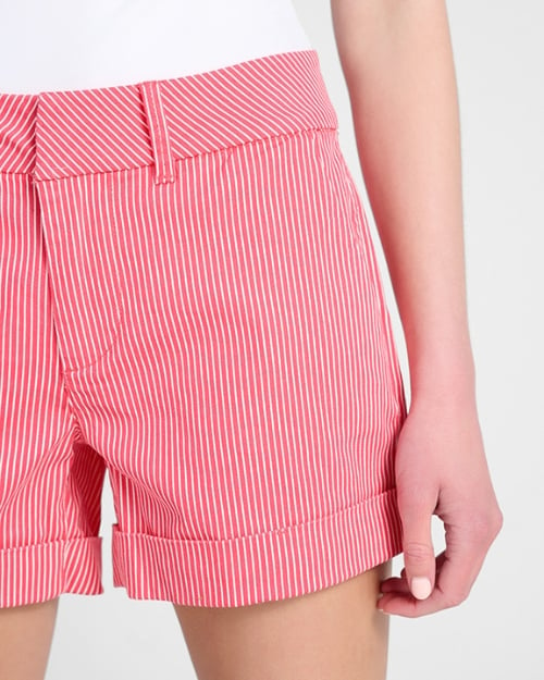 An up-close photo of a Wantable model wearing a pair of pinstriped tailored shorts. 