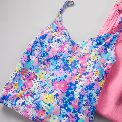 Close up of a bright floral printed cami.