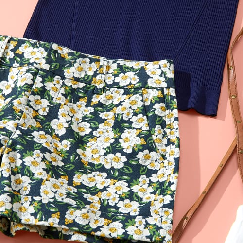 Close up of floral trouser shorts.