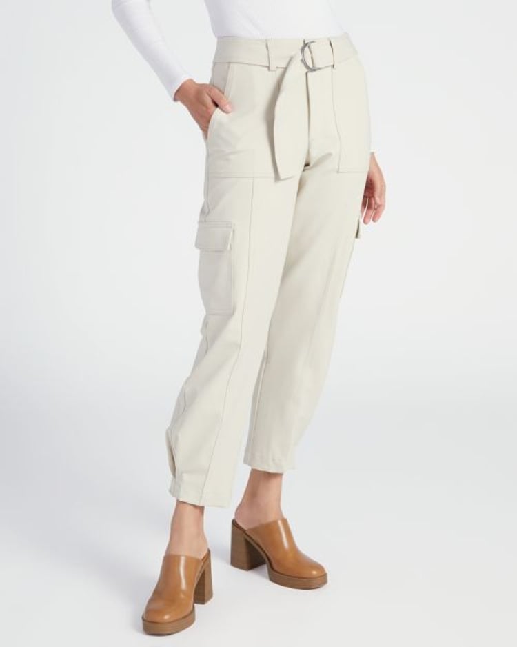 Elevated white cargo pants with a matching belt. 